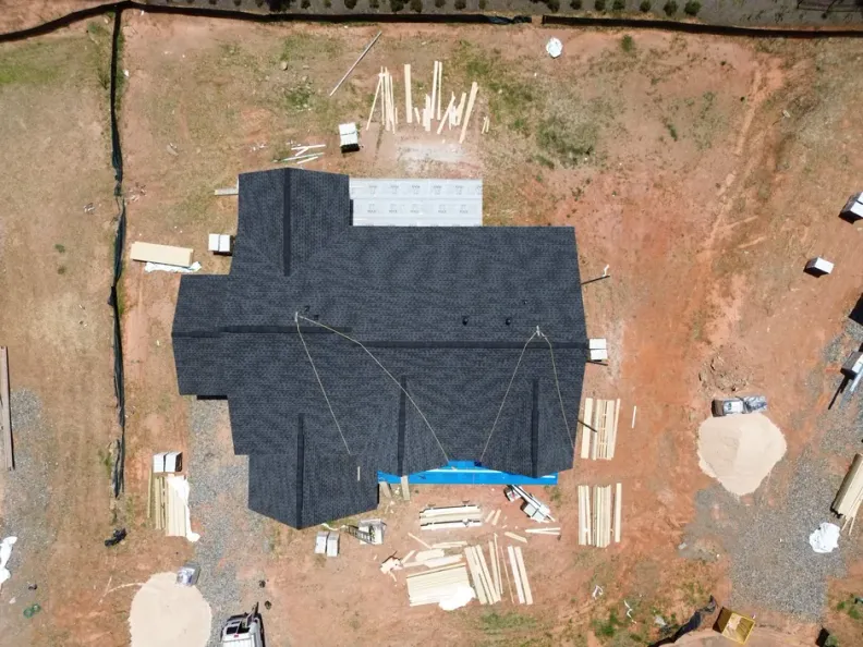 Best Cumming Roofer team completing a residential roof replacement project in Cumming, GA